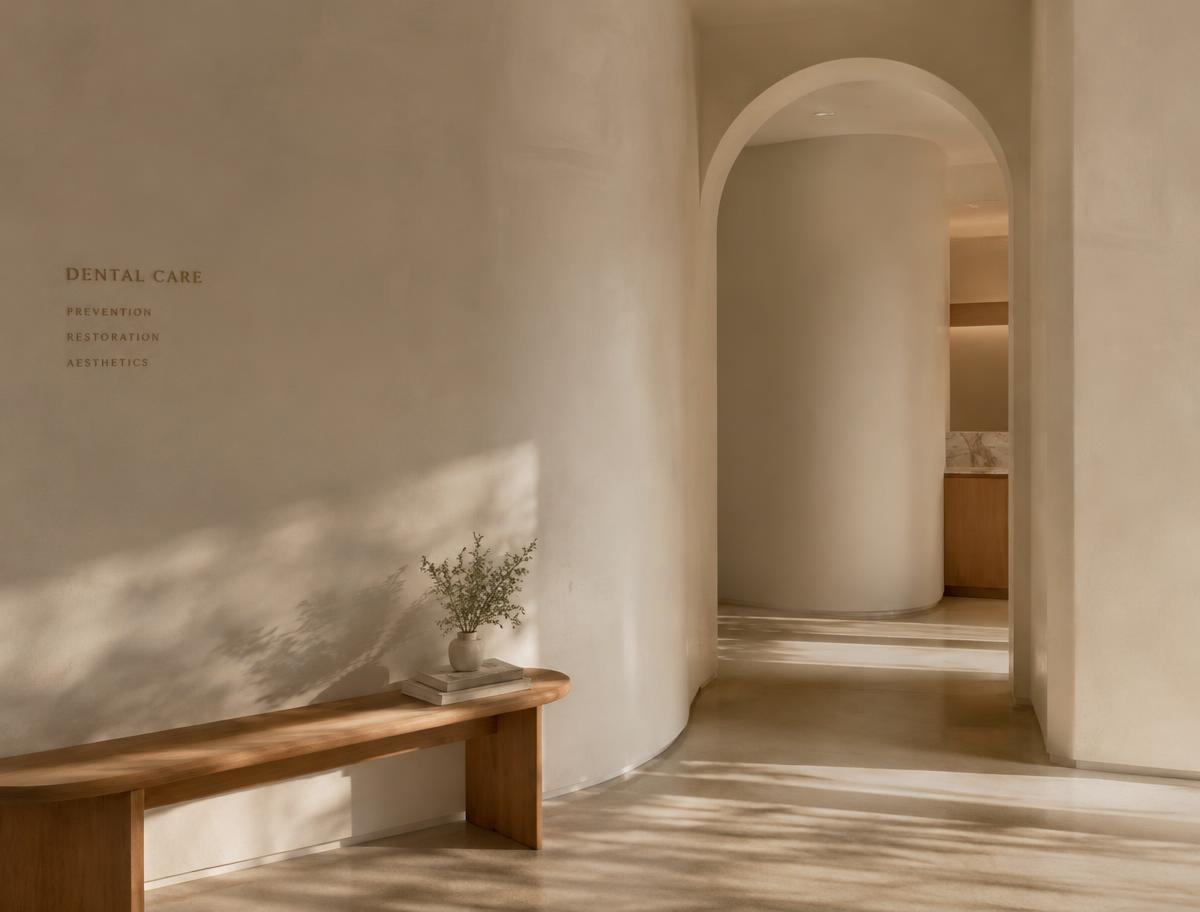 A softly lit arched hallway in the practice